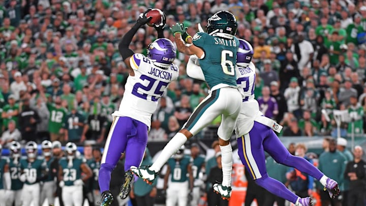 Sep 14, 2023; Philadelphia, Pennsylvania, USA; Minnesota Vikings safety Theo Jackson (25) intercepts pass intended for Philadelphia Eagles wide receiver DeVonta Smith (6) during the first quarter at Lincoln Financial Field. Sep 14, 2023; Philadelphia, Pennsylvania, USA; Minnesota Vikings safety Theo Jackson (25) intercepts pass intended for Philadelphia Eagles wide receiver DeVonta Smith (6) during the first quarter at Lincoln Financial Field.