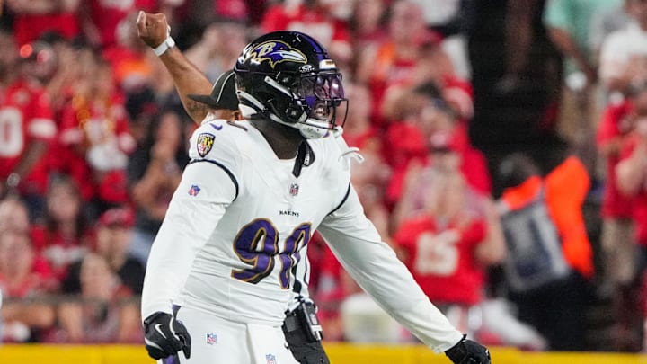 Sep 5, 2024; Kansas City, Missouri, USA; Baltimore Ravens linebacker David Ojabo (90) celebrates after a sack against the Kansas City Chiefs during the first half at GEHA Field at Arrowhead Stadium. Mandatory Credit: Denny Medley-Imagn Images