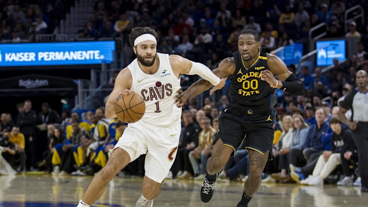 Dec 30, 2024; San Francisco, California, USA; Cleveland Cavaliers guard Max Strus (1) drives past Golden State Warriors forward Jonathan Kuminga (00) during the fourth quarter at Chase Center. Mandatory Credit: John Hefti-Imagn Images Dec 30, 2024; San Francisco, California, USA; Cleveland Cavaliers guard Max Strus (1) drives past Golden State Warriors forward Jonathan Kuminga (00) during the fourth quarter at Chase Center. Mandatory Credit: John Hefti-Imagn Images