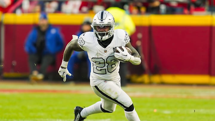 Nov 29, 2024; Kansas City, Missouri, USA; Las Vegas Raiders running back Sincere McCormick (28) during the second half against the Kansas City Chiefs at GEHA Field at Arrowhead Stadium. Mandatory Credit: Jay Biggerstaff-Imagn Images