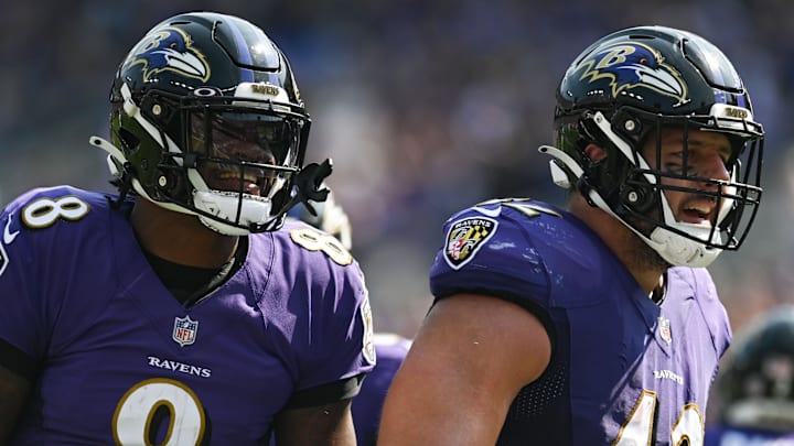 Sep 18, 2022; Baltimore, Maryland, USA;Baltimore Ravens quarterback Lamar Jackson (8) and fullback Patrick Ricard (42) reacted after a play during the first half against the Miami Dolphins  at M&T Bank Stadium. Mandatory Credit: Tommy Gilligan-Imagn Images