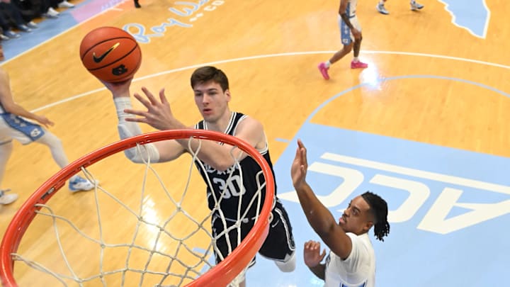 Feb 3, 2024; Chapel Hill, North Carolina, USA; Duke Blue Devils center Kyle Filipowski (30) shoots