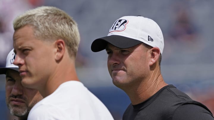 Aug 17, 2024; Chicago, Illinois, USA; Cincinnati Bengals head coach Zac Taylor, right, and quarterback Joe Burrow on the sidelines before the game against the Chicago Bears at Soldier Field. Mandatory Credit: David Banks-USA TODAY Sports