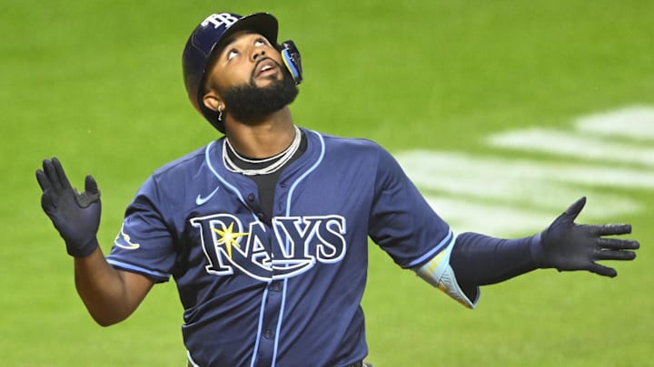 Aug 25, 2025; Cleveland, Ohio, USA; Tampa Bay Rays third baseman Junior Caminero (13) celebrates his solo home run in the seventh inning against the Cleveland Guardians at Progressive Field. Mandatory Credit: David Richard-Imagn Images