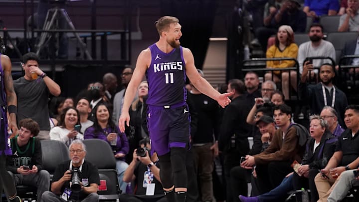Mar 24, 2025; Sacramento, California, USA; Sacramento Kings center Domantas Sabonis (11) reacts after the Kings made a basket while being fouled against the Boston Celtics in the first quarter at the Golden 1 Center. Mandatory Credit: Cary Edmondson-Imagn Images