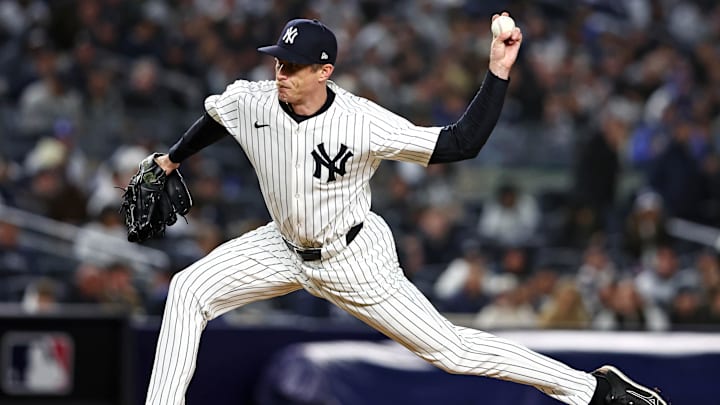 Oct 15, 2024; Bronx, New York, USA; New York Yankees pitcher Tim Hill (54) pitches during the fifth inning against the Cleveland Guardians in game two of the ALCS for the 2024 MLB Playoffs at Yankee Stadium. Mandatory Credit: Wendell Cruz-Imagn Images