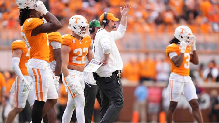 Tennessee head coach Josh Heupel calls the team over after an interception during a game between Tennessee and Alabama at Neyland Stadium in Knoxville, Tenn., Saturday, Oct. 19, 2024.