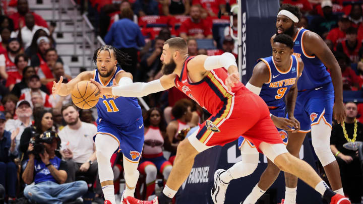 Oct 28, 2023; New Orleans, Louisiana, USA; New York Knicks guard Jalen Brunson (11) and New Orleans Pelicans center Jonas Valanciunas (17) battle for the ball during the first quarter at Smoothie King Center. Mandatory Credit: Matthew Dobbins-USA TODAY Sports Oct 28, 2023; New Orleans, Louisiana, USA; New York Knicks guard Jalen Brunson (11) and New Orleans Pelicans center Jonas Valanciunas (17) battle for the ball during the first quarter at Smoothie King Center. Mandatory Credit: Matthew Dobbins-USA TODAY Sports
