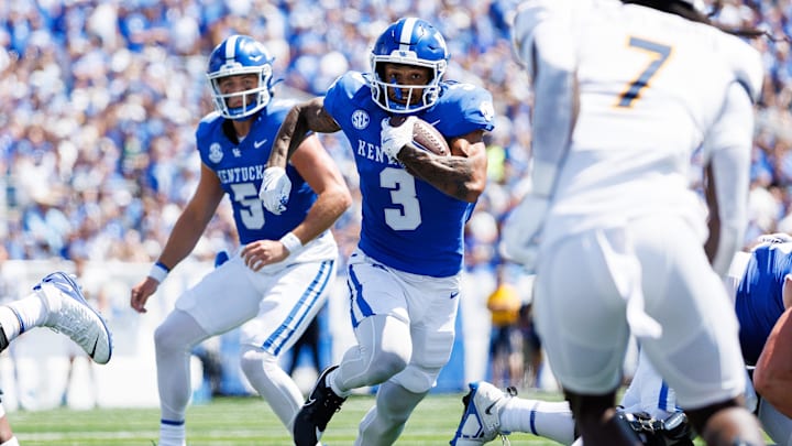 Aug 30, 2025; Lexington, Kentucky, USA; Kentucky Wildcats running back Seth McGowan (3) runs the ball during the first quarter against the Toledo Rockets at Kroger Field. Mandatory Credit: Jordan Prather-Imagn Images