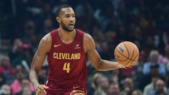 Feb 14, 2024; Cleveland, Ohio, USA; Cleveland Cavaliers forward Evan Mobley (4) brings the ball up