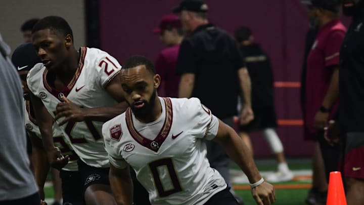 Florida State football receivers Darrion Williamson (21) and Ja'Khi Douglas take part in the final Tour of Duty winter workouts ahead of 2024 spring practices on Thursday, March 7, 2024.