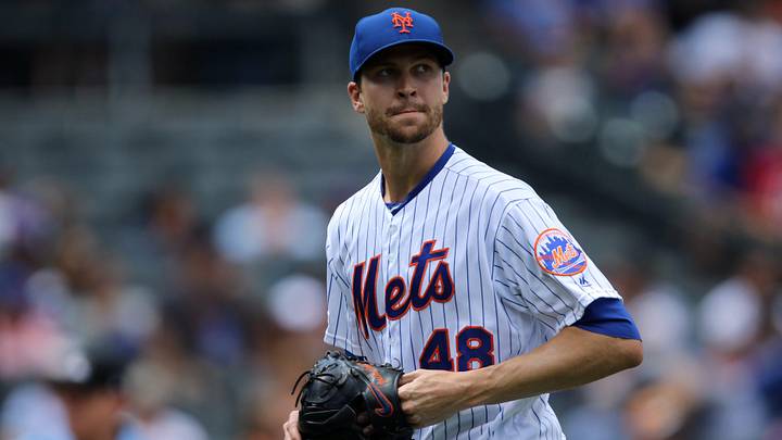 Jacob deGrom, looks at the scoreboard before heading back to the dugout.  After the top of the first, the Mets were down, 3-0.  Sunday, August 11, 2019

Mets Vs Nationals
