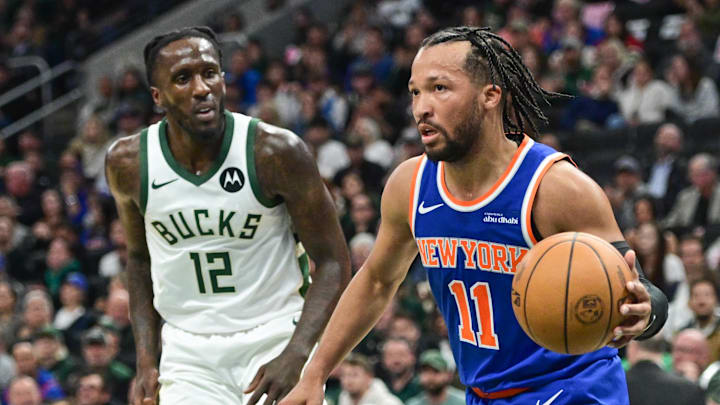 Oct 28, 2025; Milwaukee, Wisconsin, USA; New York Knicks guard Jalen Brunson (11) looks for a shot against Milwaukee Bucks guard Taurean Prince (12) in the second quarter at Fiserv Forum. Mandatory Credit: Benny Sieu-Imagn Images
