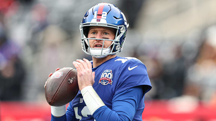 Dec 15, 2024; East Rutherford, New Jersey, USA; New York Giants quarterback Tim Boyle (12) warms up before the game against the Baltimore Ravens at MetLife Stadium. Mandatory Credit: Vincent Carchietta-Imagn Images
