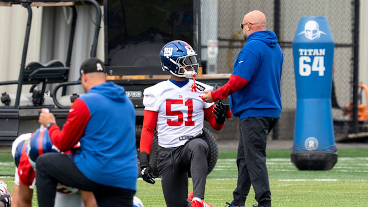 Abdul Carter, outside linebacker with the NY Giants, speaks with head coach Brian Daboll during practice at Quest Diagnostics Training Center, East Rutherford, NJ, May 28, 2025.