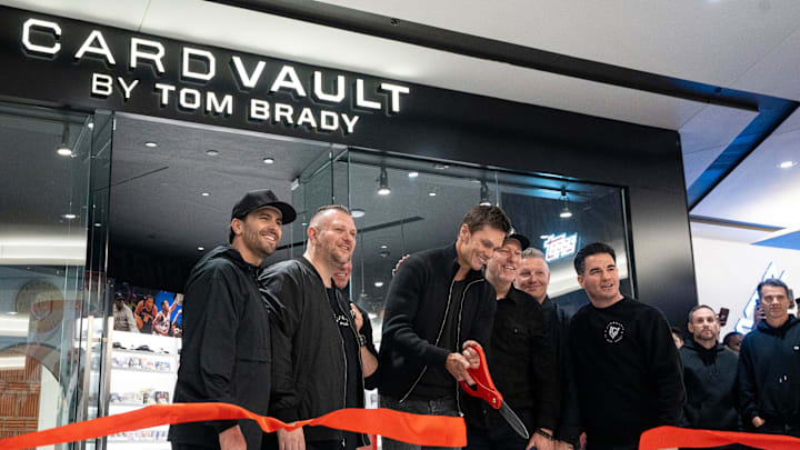 Tom Brady cuts the ribbon for the grand opening of Card Vault by Tom Brady, a sports card and memorabilia retailer at American Dream, East Rutherford, Friday, Apr. 11, 2025.