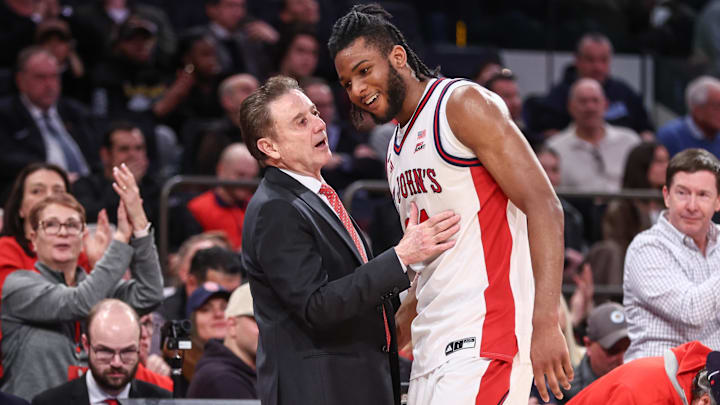 Jan 13, 2026; New York, New York, USA;  St. John's basketball head coach Rick Pitino greets forward Zuby Ejiofor (24) after substituting him out of the game in the second half against the Marquette Golden Eagles at Madison Square Garden
