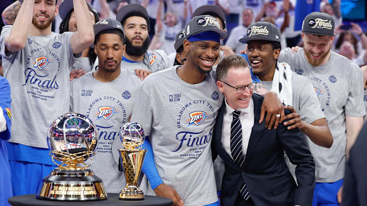 May 28, 2025; Oklahoma City, Oklahoma, USA; Oklahoma City Thunder guard Shai Gilgeous-Alexander hugs Oklahoma City Thunder executive vice president and general manager Sam Presti after their team defeated the Minnesota Timberwolves in game five of the western conference finals for the 2025 NBA Playoffs at Paycom Center. Mandatory Credit: Alonzo Adams-Imagn Images