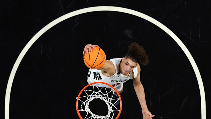 Cincinnati Bearcats guard Dan Skillings Jr. (0) dunks in the second half of a college basketball game against the Bradley Braves during a second-round game of the National Invitation Tournament,, Saturday, March 23, 2024, at Fifth Third Arena in Cincinnati. Cincinnati Bearcats guard Dan Skillings Jr. (0) dunks in the second half of a college basketball game against the Bradley Braves during a second-round game of the National Invitation Tournament,, Saturday, March 23, 2024, at Fifth Third Arena in Cincinnati.