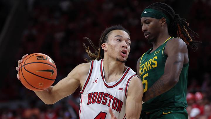 Mar 4, 2026; Houston, Texas, USA; Houston Cougars guard Kingston Flemings (4) drives to the basket against Baylor Bears guard Obi Agbim (5) in the second half at Fertitta Center. Mandatory Credit: Thomas Shea-Imagn Images Mar 4, 2026; Houston, Texas, USA; Houston Cougars guard Kingston Flemings (4) drives to the basket against Baylor Bears guard Obi Agbim (5) in the second half at Fertitta Center. Mandatory Credit: Thomas Shea-Imagn Images