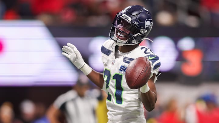 Dec 7, 2025; Atlanta, Georgia, USA; Seattle Seahawks cornerback Devon Witherspoon (21) celebrates after a fumble recovery against the Atlanta Falcons in the third quarter at Mercedes-Benz Stadium. Mandatory Credit: Brett Davis-Imagn Images Dec 7, 2025; Atlanta, Georgia, USA; Seattle Seahawks cornerback Devon Witherspoon (21) celebrates after a fumble recovery against the Atlanta Falcons in the third quarter at Mercedes-Benz Stadium. Mandatory Credit: Brett Davis-Imagn Images