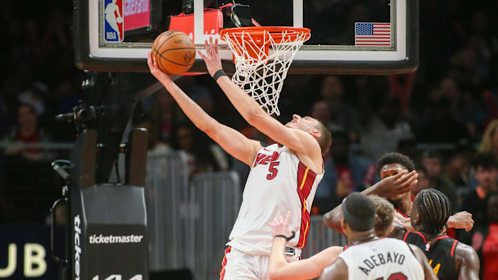 Apr 9, 2024; Atlanta, Georgia, USA; Miami Heat forward Nikola Jovic (5) shoots against the Atlanta Hawks in the second half at State Farm Arena. Mandatory Credit: Brett Davis-Imagn Images