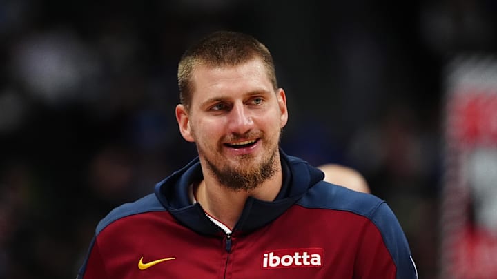 Nov 10, 2024; Denver, Colorado, USA; Denver Nuggets center Nikola Jokic (15) reacts before the game against the Dallas Mavericks at Ball Arena. Mandatory Credit: Ron Chenoy-Imagn Images Nov 10, 2024; Denver, Colorado, USA; Denver Nuggets center Nikola Jokic (15) reacts before the game against the Dallas Mavericks at Ball Arena. Mandatory Credit: Ron Chenoy-Imagn Images