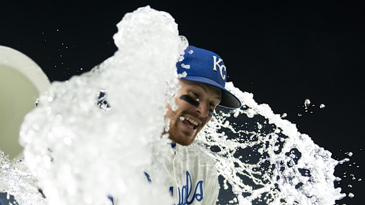 Sep 4, 2025; Kansas City, Missouri, USA; Kansas City Royals shortstop Bobby Witt Jr. (7) is doused by center fielder Kyle Isbel (28) and second baseman Tyler Tolbert (2) after defeating the Los Angeles Angels at Kauffman Stadium. Mandatory Credit: Jay Biggerstaff-Imagn Images