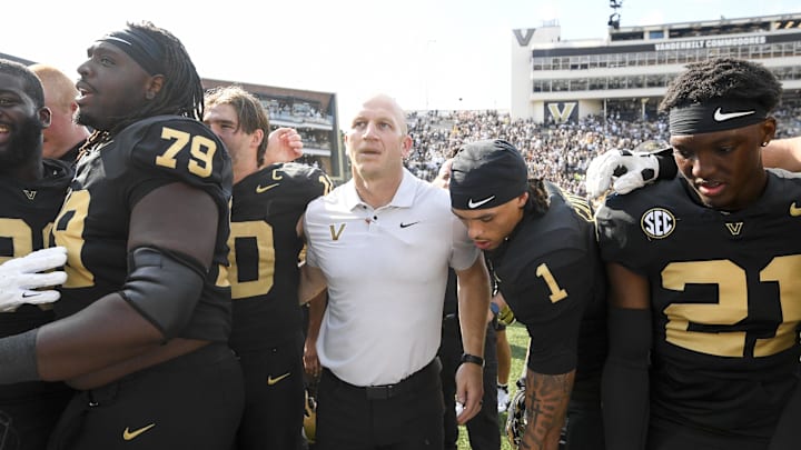 Oct 18, 2025; Nashville, Tennessee, USA; Vanderbilt Commodores head coach Clark Lea celebrates the win with his team and the student section against the Louisiana State Tigers during the second half at FirstBank Stadium. Mandatory Credit: Steve Roberts-Imagn Images Oct 18, 2025; Nashville, Tennessee, USA; Vanderbilt Commodores head coach Clark Lea celebrates the win with his team and the student section against the Louisiana State Tigers during the second half at FirstBank Stadium. Mandatory Credit: Steve Roberts-Imagn Images