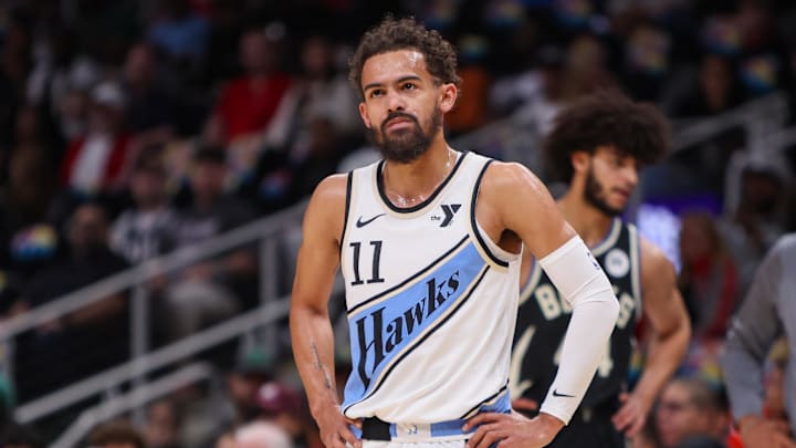Feb 7, 2025; Atlanta, Georgia, USA; Atlanta Hawks guard Trae Young (11) in action against the Milwaukee Bucks in the first quarter at State Farm Arena. Mandatory Credit: Brett Davis-Imagn Images