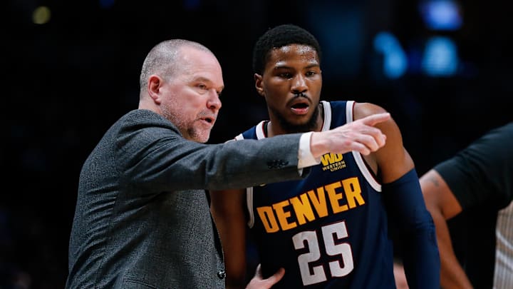 Dec 18, 2018; Denver, CO, USA; Denver Nuggets head coach Michael Malone talks with guard Malik Beasley (25) in the third quarter against the Dallas Mavericks at the Pepsi Center. Mandatory Credit: Isaiah J. Downing-Imagn Images Dec 18, 2018; Denver, CO, USA; Denver Nuggets head coach Michael Malone talks with guard Malik Beasley (25) in the third quarter against the Dallas Mavericks at the Pepsi Center. Mandatory Credit: Isaiah J. Downing-Imagn Images