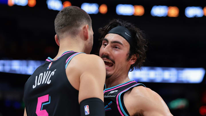Dec 27, 2025; Miami, Florida, USA; Miami Heat forward Jaime Jaquez Jr. (11) celebrates with forward Nikola Jovic (5) against the Indiana Pacers during the second half at Kaseya Center. Mandatory Credit: Sam Navarro-Imagn Images