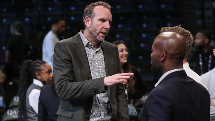 Feb 29, 2024; Brooklyn, New York, USA;  Brooklyn Nets General Manager Sean Marks speaks to a group of people prior to the game against the Atlanta Hawks at Barclays Center. Mandatory Credit: Wendell Cruz-Imagn Images