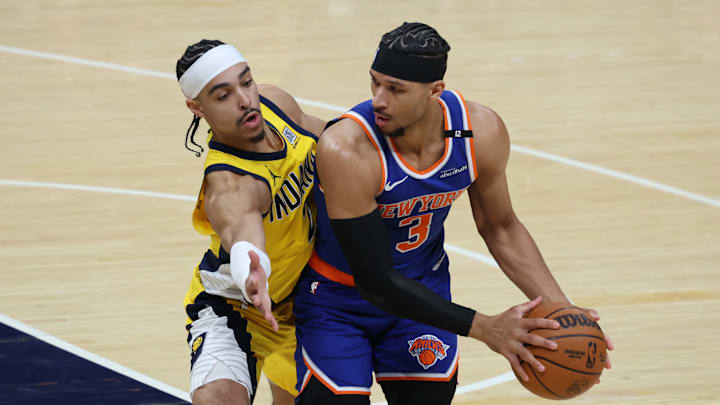New York Knicks guard Josh Hart drives to the hoop past Indiana Pacers guard Andrew Nembhard. Mandatory Credit: Trevor Ruszkowski-Imagn Images