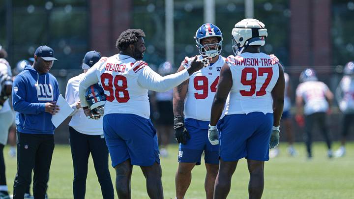 Jun 3, 2026; East Rutherford, NJ, USA;  New York Giants defensive tackle Leki Fotu (98) talks with defensive tackle Bobby Jamison-Travis (97) and defensive tackle Josh Tupou (94) talk during organized team activities at Quest Diagnostics Training Center.  