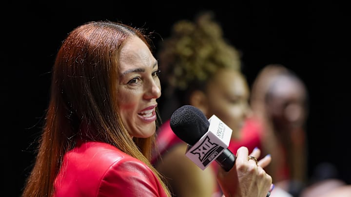 Oct 22, 2024; Kansas City, MO, USA; Arizona Wildcats head coach Adia Barnes talks to media during the Big 12 Women’s Basketball Media Day at T-Mobile Center. 