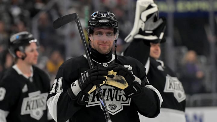 Apr 23, 2025; Los Angeles, California, USA; Los Angeles Kings center Anze Kopitar (11) makes a heart with his gloves for he daughter after defeating the Edmonton Oilers in game 2 of the 2025 Stanley Cup Playoffs at Crypto.com Arena. Mandatory Credit: Jayne Kamin-Oncea-Imagn Images