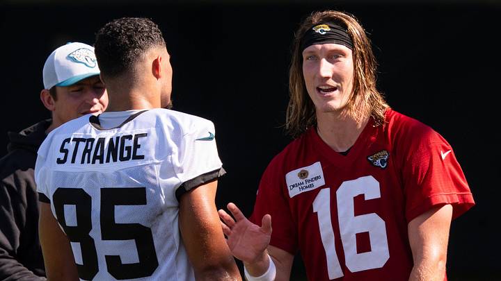 Jacksonville Jaguars Offensive Coordinator Grant Udinski listens to Jacksonville Jaguars tight end Brenton Strange (85) talk with Jacksonville Jaguars quarterback Trevor Lawrence (16) after the Jacksonville Jaguars’ 18th and final training camp practice at Miller Electric Center in Jacksonville, Fla. Wednesday August 20, 2025. [Doug Engle/Florida Times-Union]