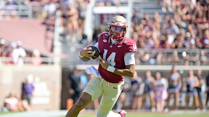Sep 26, 2026; Tallahassee, Florida, USA;  Florida State Seminoles quarterback Ashton Daniels (14) runs during the first quarter against the Central Arkansas Bears at Doak S. Campbell Stadium.  Mandatory Credit: Melina Myers-Imagn Images