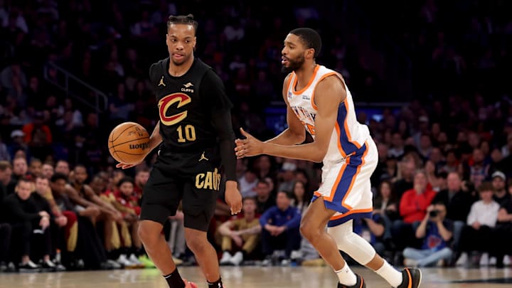 Apr 11, 2025; New York, New York, USA; Cleveland Cavaliers guard Darius Garland (10) controls the ball against New York Knicks forward Mikal Bridges (25) during the first quarter at Madison Square Garden. Mandatory Credit: Brad Penner-Imagn Images
