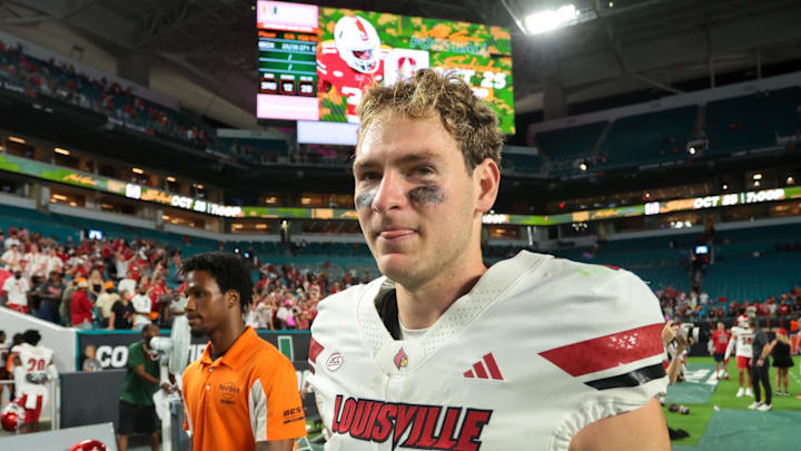 Oct 17, 2025; Miami Gardens, Florida, USA; Louisville Cardinals quarterback Miller Moss (7) looks on after the game against the Miami Hurricanes at Hard Rock Stadium. Oct 17, 2025; Miami Gardens, Florida, USA; Louisville Cardinals quarterback Miller Moss (7) looks on after the game against the Miami Hurricanes at Hard Rock Stadium.