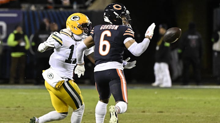 Jan 10, 2026; Chicago, IL, USA;  Chicago Bears cornerback Kyler Gordon (6) breaks up a pass to Green Bay Packers wide receiver Jayden Reed (11) during the second half of an NFC Wild Card Round game at Soldier Field. Mandatory Credit: Matt Marton-Imagn Images
