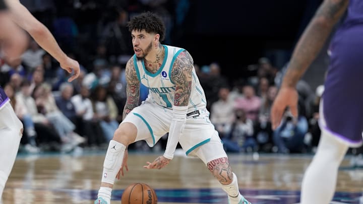Charlotte Hornets guard LaMelo Ball (1) handles the ball against the Sacramento Kings