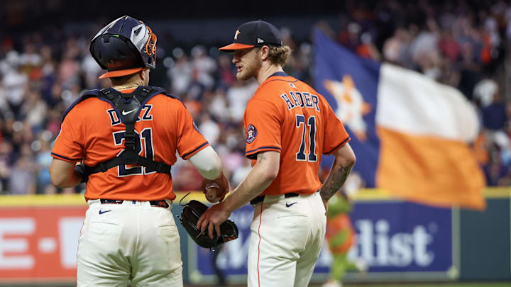 Jun 12, 2025; Houston, Texas, USA;  Houston Astros catcher Yainer Diaz (21) and relief pitcher Josh Hader (71) celebrate after defeating the Chicago White Sox at Daikin Park. 