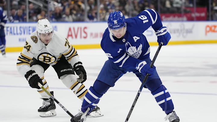 Mar 4, 2024; Toronto, Ontario, CAN; Toronto Maple Leafs forward Mitchell Marner (16) tries to get