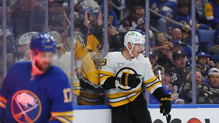 Apr 19, 2026; Buffalo, New York, USA; Boston Bruins center Morgan Geekie (39) reacts after scoring a goal during the first period against the Buffalo Sabres in game one of the first round of the 2026 Stanley Cup Playoffs at KeyBank Center. Mandatory Credit: Timothy T. Ludwig-Imagn Images