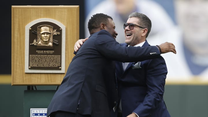 Former Seattle Mariners and Hall of Fame members Ken Griffey Jr. (left) and Edgar Martinez hug during a ceremony before the start of a game against the Tampa Bay Rays at T-Mobile Park in 2019. Former Seattle Mariners and Hall of Fame members Ken Griffey Jr. (left) and Edgar Martinez hug during a ceremony before the start of a game against the Tampa Bay Rays at T-Mobile Park in 2019.