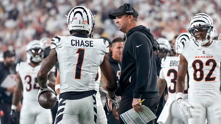 Cincinnati Bengals wide receiver Ja'Marr Chase (1) and head coach Zac Taylor celebrate a touchdown in the second quarter of the NFL Week 7 game between the Cincinnati Bengals and the Pittsburgh Steelers at Paycor Stadium in downtown Cincinnati on Thursday, Oct. 16, 2025.