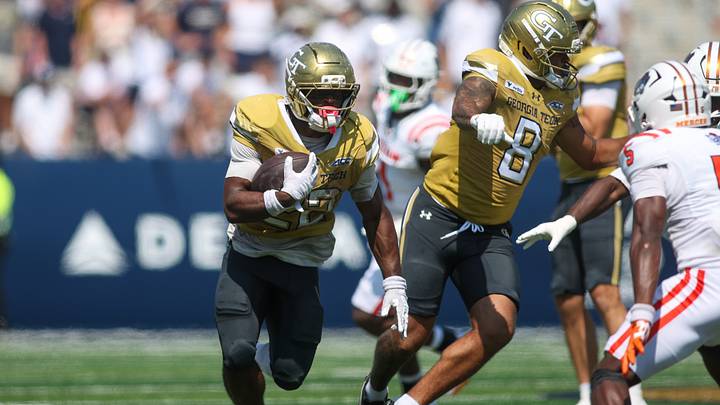 Sep 19, 2026; Atlanta, Georgia, USA; Georgia Tech Yellow Jackets running back Justice Haynes (22) runs the ball against the Mercer Bears in the third quarter at Bobby Dodd Stadium at Hyundai Field. Mandatory Credit: Brett Davis-Imagn Images Sep 19, 2026; Atlanta, Georgia, USA; Georgia Tech Yellow Jackets running back Justice Haynes (22) runs the ball against the Mercer Bears in the third quarter at Bobby Dodd Stadium at Hyundai Field. Mandatory Credit: Brett Davis-Imagn Images