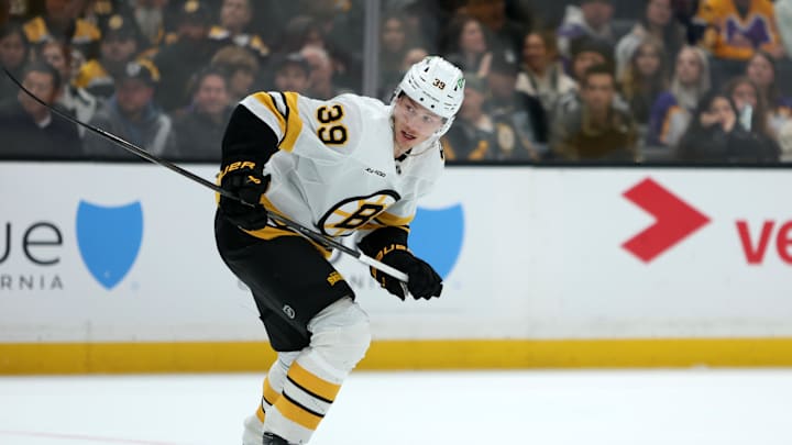 Nov 21, 2025; Los Angeles, California, USA;  Boston Bruins center Morgan Geekie (39) skates on the ice during the third period against the Los Angeles Kings at Crypto.com Arena. Mandatory Credit: Kiyoshi Mio-Imagn Images